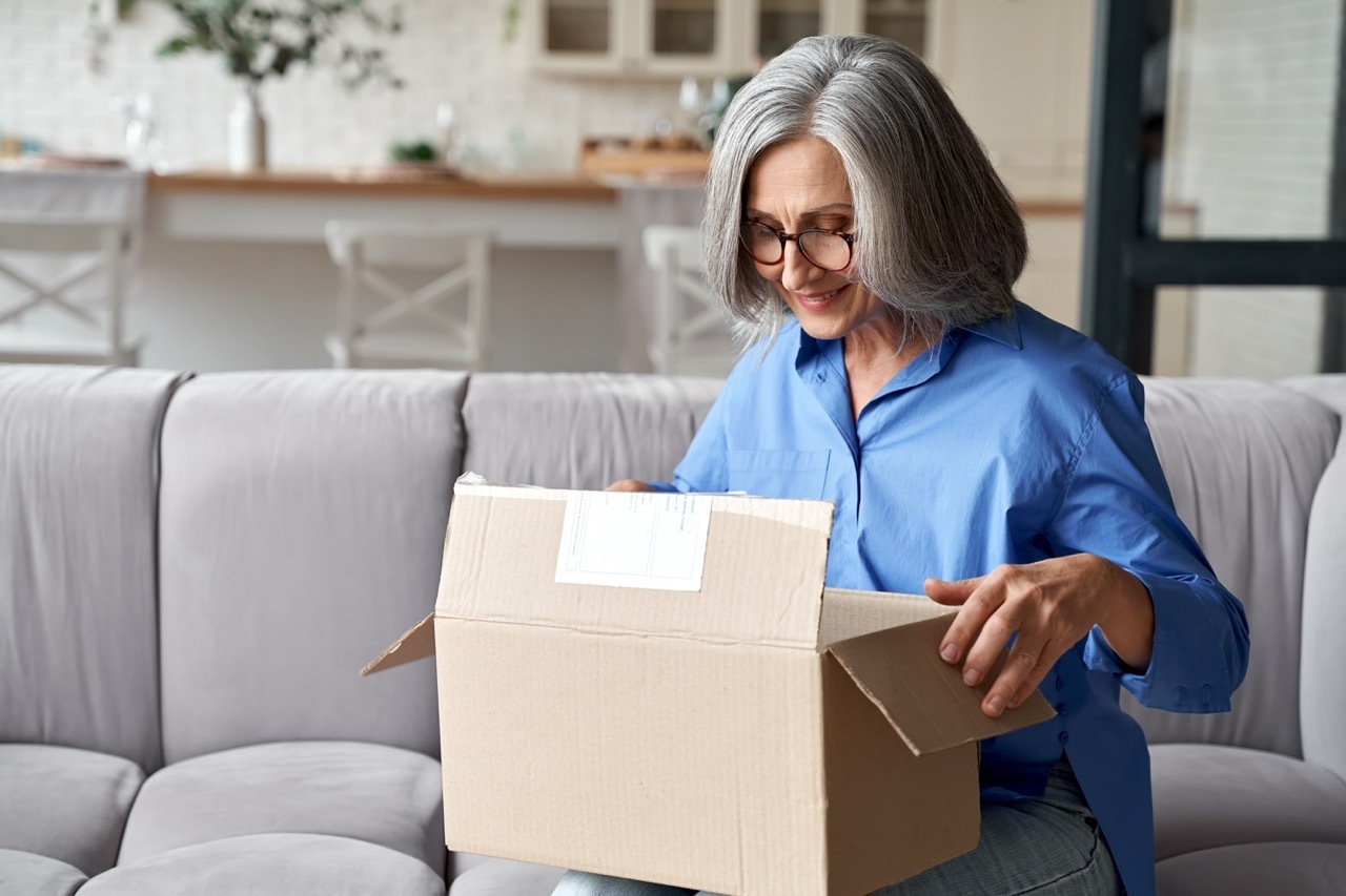 Woman Looking In Box
